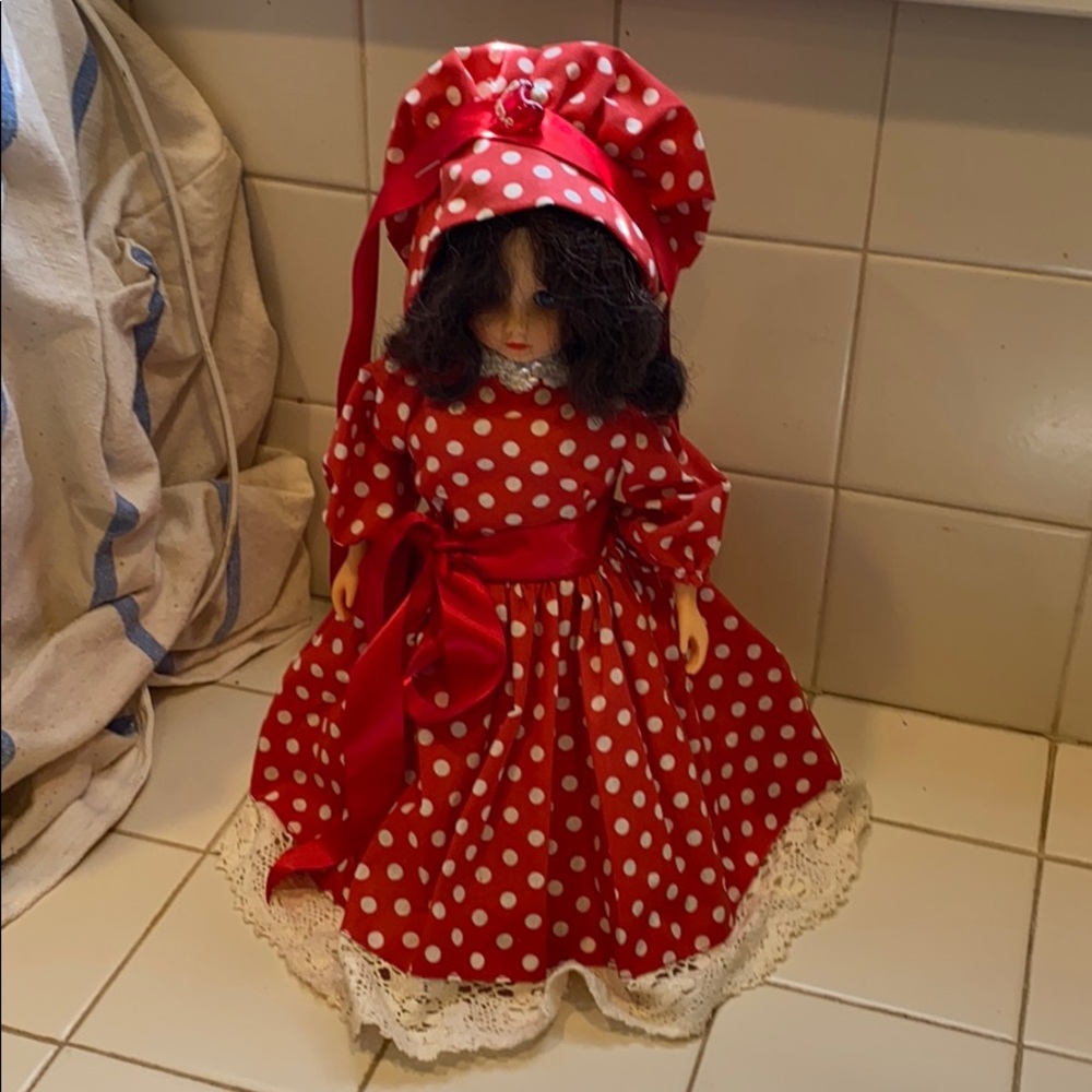 Vintage souvenir doll with handmade stand